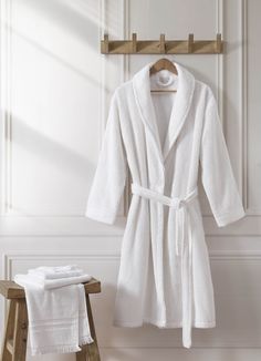 Bring the spa home with this luxurious, kimono-style robe. Featuring a chic and timeless ribbed texture for superior post-soak style, this bathrobe is made entirely from long-staple Turkish cotton for extra softness and absorbency. 100% long-staple Turkish cotton Features a tie waist Lightweight and fast-drying OEKO-TEX® Standard 100 certified Made in Turkey Cute Bathrobe Aesthetic, Bathrobes Aesthetic, Elegant White Robe For Relaxation, Elegant White Lounging Robe, White Robe Aesthetic, Bath Robe Aesthetic, Bathrobe Aesthetic, 2025 Wishlist, Spa Robes