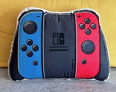 a pillow made to look like video game controllers