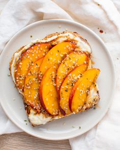 grilled peaches and cream cheese on toasted bread with sprinkles