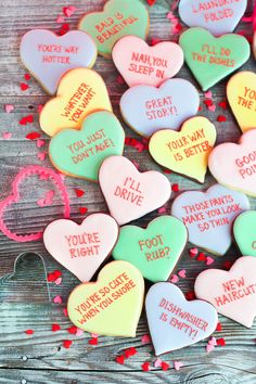 heart shaped cookies that say i'll take you to the movies