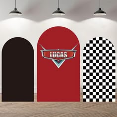 three doors with the word lucas on them and checkered doormats next to each other