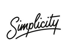 the word simplicity written in cursive writing