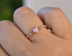 Dainty ring is set with Heart shaped Pink Opal and Cubic Zirconia stones. Wear this ring alone for subtle boldness or pair with other rings. Ring comes in Rose Gold color. Details -18K Rose Gold plated over 925 Sterling silver -Ring is set with synthetic Pink Opal stone and CZ stone -Sold as Single ring Promise Ring Inspiration, Heart Opal Ring, Promise Rings Opal, Pink Ring Aesthetic, Pink Promise Rings, Promise Rings Aesthetic, Promise Rings Pink, Pretty Promise Rings, Aesthetic Promise Rings