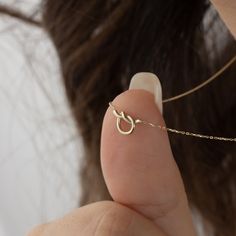 This real gold knot necklace is a minimalist symbol of eternal love. Designed as a friendship knot necklace in solid gold, it is the perfect and meaningful gift for Valentine's Day. In short, an ideal gift for your girlfriend, wife or best friend, this necklace expresses the beauty of ties of the heart in the most elegant way. Like our other products, it is sent with our fast shipping service and stylish gift box as standard.  NECKLACE DETAILS * Material:14 carat solid gold * Dimensions: 6mm x 1 Jewelry For Girlfriend, Friendship Knot, Promise Jewelry, Necklace Friendship, 20 Inch Necklace, Love Knot Necklace, Valentines Day Gifts For Her, Handmade Gift Wrap, Gifts For Your Girlfriend