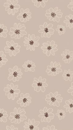 an abstract floral pattern with brown and white flowers