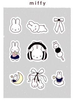 an assortment of stickers with various animals and symbols on the front, including headphones