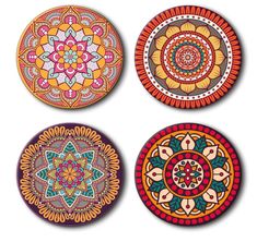 four colorful plates with designs on them