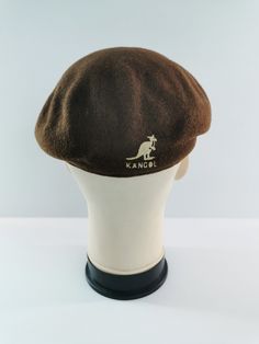 FREE EXPRESS SHIPPING WHEN PURCHASE MORE THAN $40USD * For sale is a used vintage Kangol hat. * Overall condition is 7/10 good. * Made in England. * 100% Wool. * Size M. * No major defect spotted. * Just signs of wear and ages. * Good in shape. * Please refer the pictures. SHIPPING We use DHL Express/FedEx Express. Approximately, shipping will take around 3 to 8 days to delivery. Please read the descriptions briefly and THANK YOU :) https://www.etsy.com/shop/PROjectaStore Additional notes: - We don't accept return regarding sizing and measurements issue. Green Kangol Hat, Vintage Brown Hats For Outdoor, Vintage Brown Beret Flat Cap, Vintage Brown Hat, One Size Fits Most, Vintage Brown Flat Cap, Vintage Brown Baseball Cap One Size Fits Most, Vintage Brown Winter Baseball Cap, Kangol Hat, John Tucker