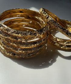 option of 2-4 bangles or sold as single 18k gold plated Durable 66-68mm or new 62-64mm solid gold plated water resistant Pre order Single Bangle, Layered Bangles, Dope Jewelry Accessories, Dope Jewelry, Jewelry Fashion Trends, Stacked Jewelry, Funky Jewelry, Bangle Set