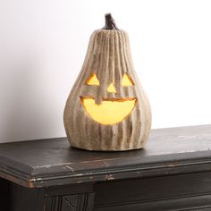 a carved pumpkin sitting on top of a table