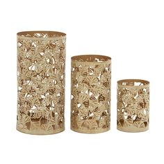 three gold colored vases sitting next to each other