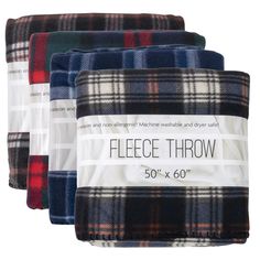 four plaid flannel throw blankets in various colors and sizes, with the price tag below them