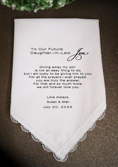 a white handkerchief with the words to our future daughter - in - law on it