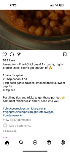 a glass bowl filled with food on top of a wooden table next to an instagram page