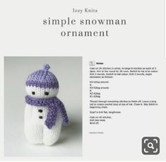 a knitted snowman ornament with a purple hat and scarf