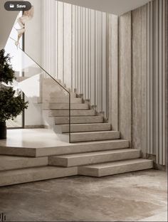 the stairs are made of marble and have glass balconies on each one side