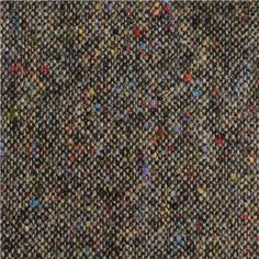 an image of a carpet with many different colors and patterns on it's surface