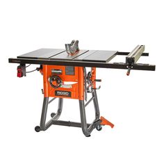 an orange table sawing machine on a white background