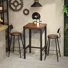 two stools and a table in a room