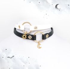 "chokers made from black or white eco strap (width 10mm/ 0,39\"). Decorated with a stainless steel charm MOON/SUN and metal o-ring. Available in 2 version: 1. White cord with SUN charm 2. Black cord with MOON charm The lenght of chokers: 32cm/12,6\" + 5cm/1,97\" of chain ATTENTION! REGISTERED LETTER- estimate shipping time is about 1-2 weeks to European Union and 3-4 weeks to outside the European Union. Tracking number doesn't work outside Poland, but it is proof of posting the package so if you Festival Choker With Moon Charm, Handmade Adjustable Pastel Goth Jewelry, Gothic White Choker Jewelry, White Gothic Choker Jewelry, Adjustable Moon Charm Choker, Gothic White Jewelry For Festivals, White Gothic Jewelry For Festivals, Gothic White Festival Jewelry, White Gothic Festival Jewelry