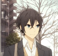 an anime character with black hair and blue eyes standing in front of a tall building