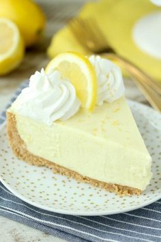 a slice of lemon pie on a white plate