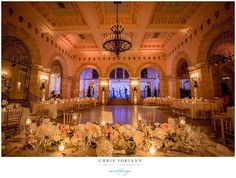 an elegant ballroom with chandeliers and tables set up for a wedding reception at the grand america hotel