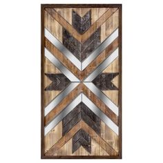 a wooden wall hanging with an arrow design on the front and back of it's frame