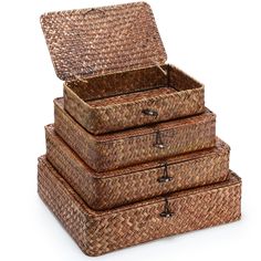 three wicker boxes stacked on top of each other