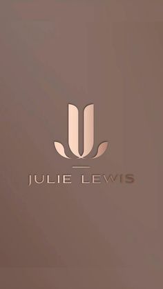 the logo for julia lewis is shown on a brown background with gold foil and leaves