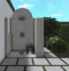 an outdoor shower in the middle of a courtyard