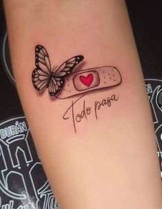 a tattoo with a butterfly and pill on the arm that says, i love papa