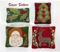 four christmas pillows with santa claus and reindeer