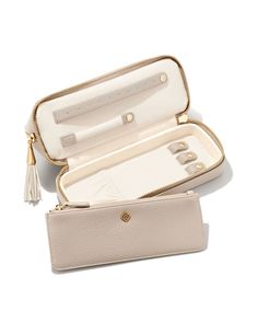 A multifunctional travel case that’s perfect for getting ready on the go. Featuring a top zipper cosmetics bag and bottom jewelry storage compartment, keep your jewels and products organized and within reach thanks to the Cosmetic & Jewelry Case in Taupe. Rectangular Zipper Pouch Case For Gift, Elegant Pouch Case For Everyday Use, Elegant Everyday Use Pouch Case, Elegant Everyday Pouch Case, Elegant Cosmetic Bag With Zipper Closure For Travel, Elegant Cosmetic Bag With Zipper For Travel, Elegant Travel Cosmetic Bag With Zipper Closure, Elegant Rectangular Cosmetic Bag For Everyday, Elegant Portable Cases For Everyday Use