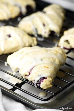 blueberry scones are cooling on the rack