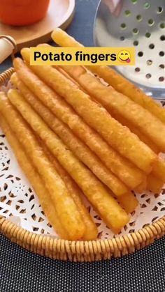 some fried food in a basket on a table