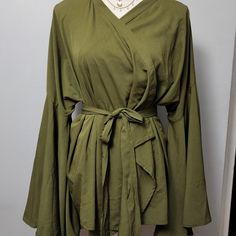 Flare Sleeves; Wrap Closure With A Matching Belt; Olive Green Casual Green Wrap Top, Casual Green Wrap Blouse, Solid Wrap Top For Spring, Casual Wrap Blouse For Spring, Long Length Blouse, Plunge Blouse, Spaghetti Strap Bodysuit, Satin Cami Top, Fishnet Top