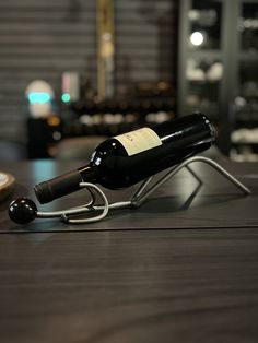 a bottle of wine sitting on top of a table