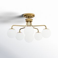 an image of a ceiling light with three lights on it's sides and four balls in the middle