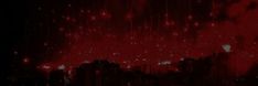 the city skyline is red and black in this artistic photo, it appears to be very dark