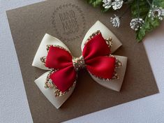 I love this bow !! Such a cute ivory , gold, and red Christmas hair bow. The perfect Christmas hair bow to celebrate your little princess' Christmas or to visit Santa. My boutique hair bows are Light weight and attached to a no-slip alligator clips, perfect for girls of all ages.  Hair Bow Measures Approx. 4" x 3". Please reference the size before purchasing to ensure it is the size you would like.  Back to Pink hair bow boutiques store :  https://www.etsy.com/shop/PinkHairBowBoutique Christmas Hairbow, Gold And Red Christmas, Holiday Hair Clips, Woman Costumes, Princess Christmas, Holiday Hair Bows, Christmas Girls, Christmas Hair Accessories, Fancy Bows