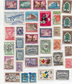 many different stamps are arranged on a sheet of paper