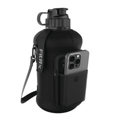 a black water bottle with a cell phone in the back and strap attached to it