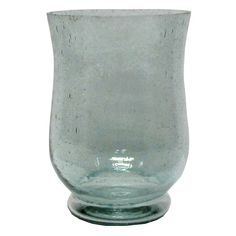 a glass vase is shown on a white background