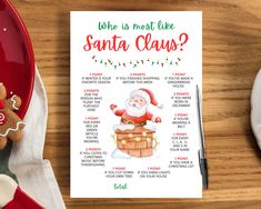 a santa clause christmas party game is on the table next to a red plate and silverware