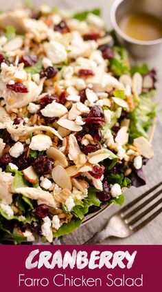 a salad with cranberries, feta cheese and almonds in it on a plate