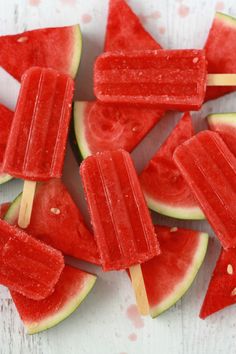 watermelon popsicles on a white table