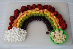 a rainbow made out of fruit and marshmallows