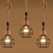 three hanging lights with rope and light bulbs