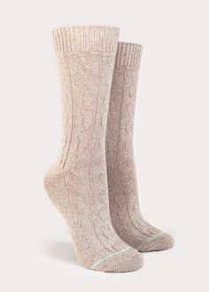 The classic cable-knit women's boot sock made with combed cotton for exceptional comfort and style. A lightweight, breathable construction to spruce up your fall-winter style. Details: Size Guide One size fits most.Recommended Women's US shoe size 6-10, Euro 36 - 41. Materials 90% Cotton, 8% Polyester, 1% Rubber, 1% SpandexMade in China Care Instructions Machine on perm press, no chlorine bleach,hang dry recommended. Comfortable Cable Knit Winter Socks, Casual Beige Socks For Fall, Cozy Outdoor Socks For Fall, Snug Beige Socks For Fall, Comfortable Fitted Cable Knit Socks, Casual Knee-high Socks For Outdoor, Comfortable Cream Socks, Beige Snug Casual Socks, Mid-calf Beige Socks For Fall